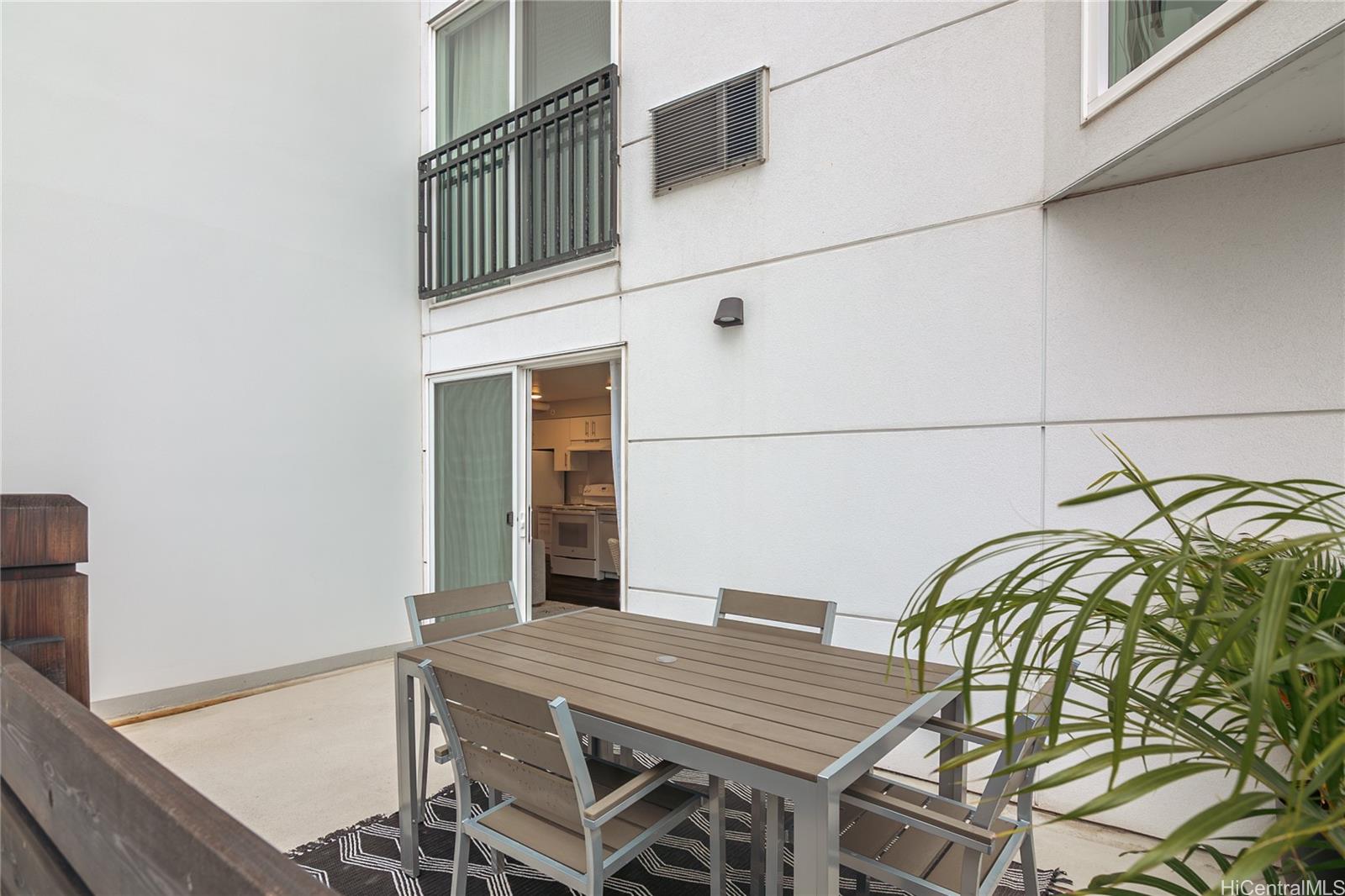 803 Waimanu Street, Unit 512 Honolulu, HI 96813 - Photo 9 of 18 a backyard of a house with seating space