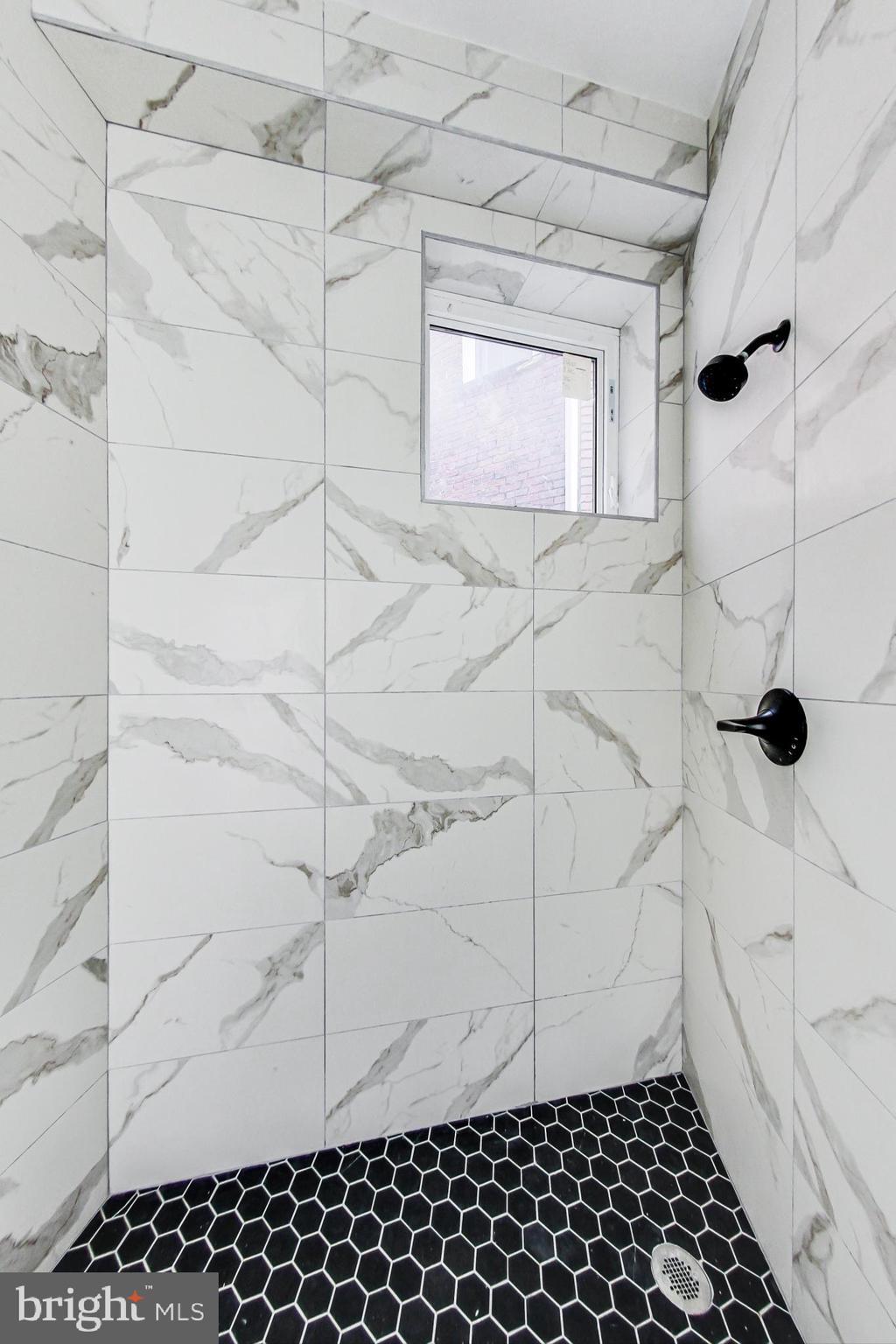 207 Florida Avenue Northwest, Unit 1 Washington, DC 20001 - Photo 15 of 26 a bathroom with a shower