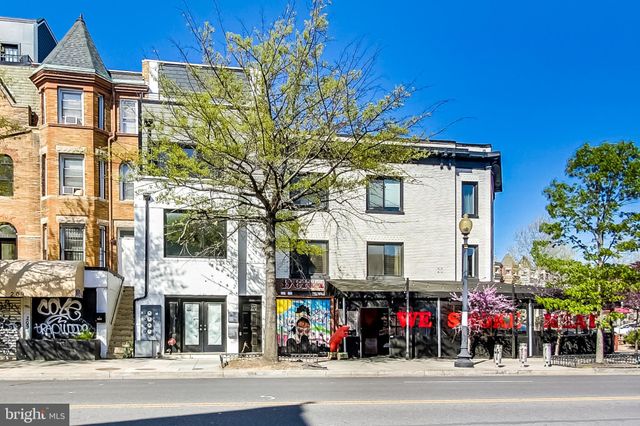 a view of a building and a people