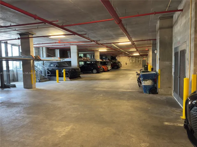 a view of a balcony with wooden floor