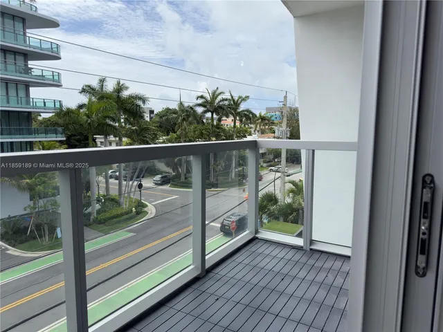 a view of a backyard with sitting area