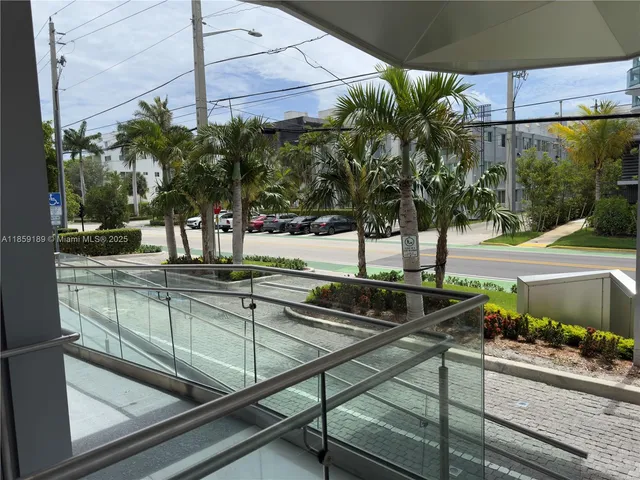 a front view of a building with garden