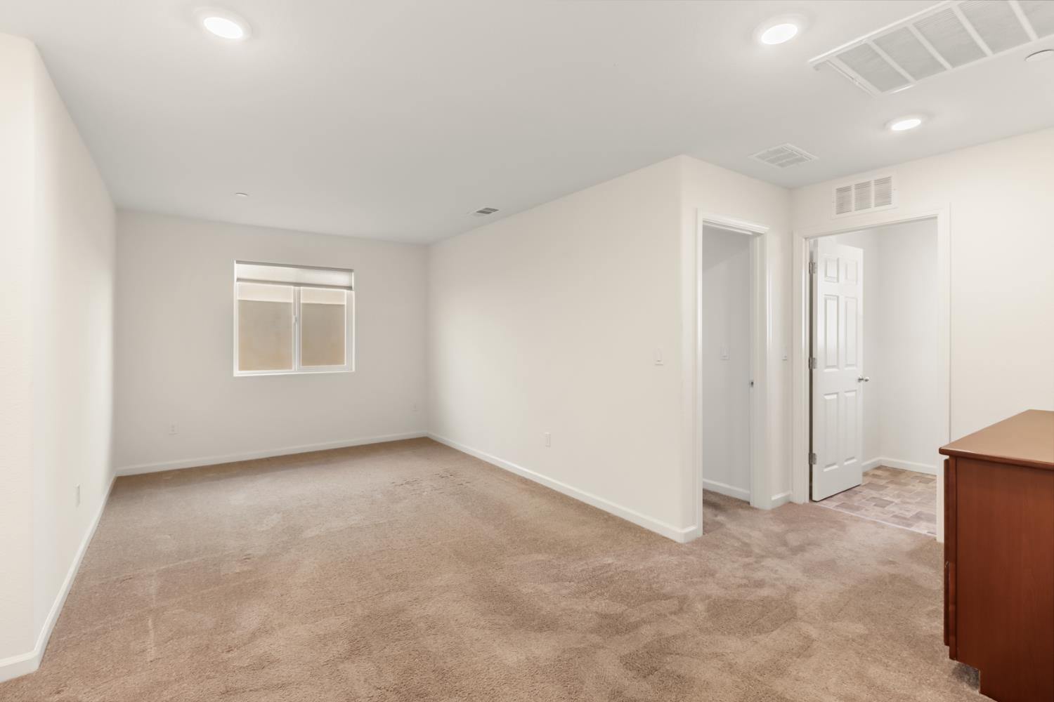 3230 Chelmer Way Rancho Cordova, CA 95670 - Photo 17 of 50 an empty room with a natural light