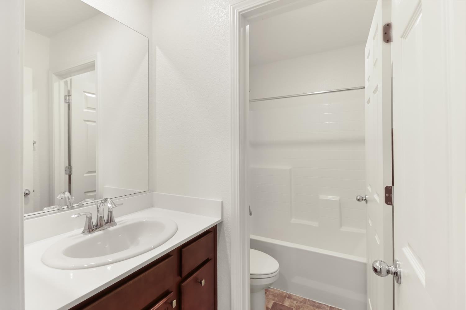 3230 Chelmer Way Rancho Cordova, CA 95670 - Photo 27 of 50 a bathroom with a sink toilet tub and shower