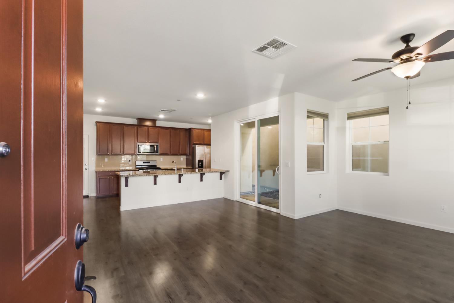 3230 Chelmer Way Rancho Cordova, CA 95670 - Photo 3 of 50 a view of a kitchen with furniture and a window