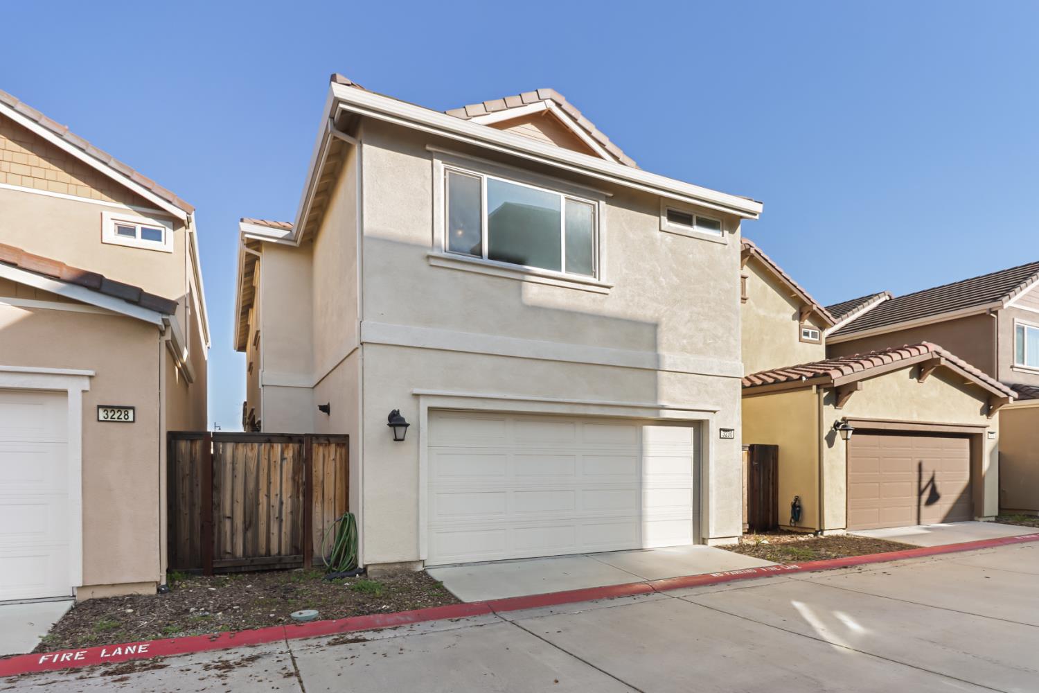 3230 Chelmer Way Rancho Cordova, CA 95670 - Photo 38 of 50 a front view of a house with a garage