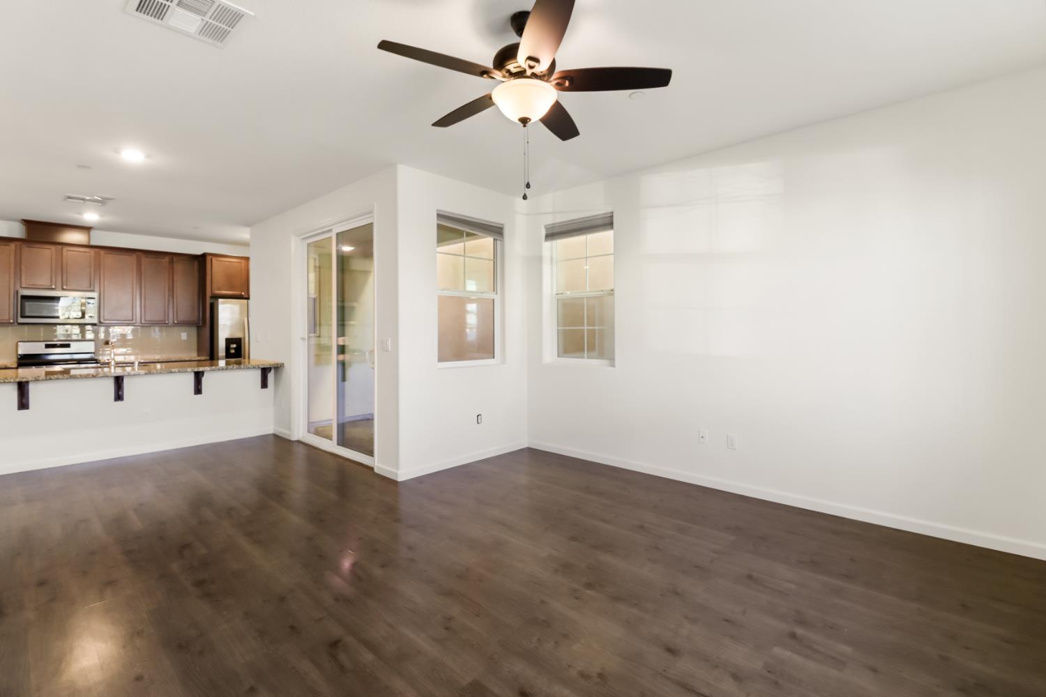 3230 Chelmer Way Rancho Cordova, CA 95670 - Photo 7 of 50 a view of a kitchen with a sink and a window