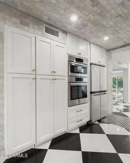 a view of a black and white checkered floor