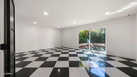 a view of a elevator with a mirror on the wall