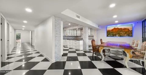 a kitchen with a stove and cabinets