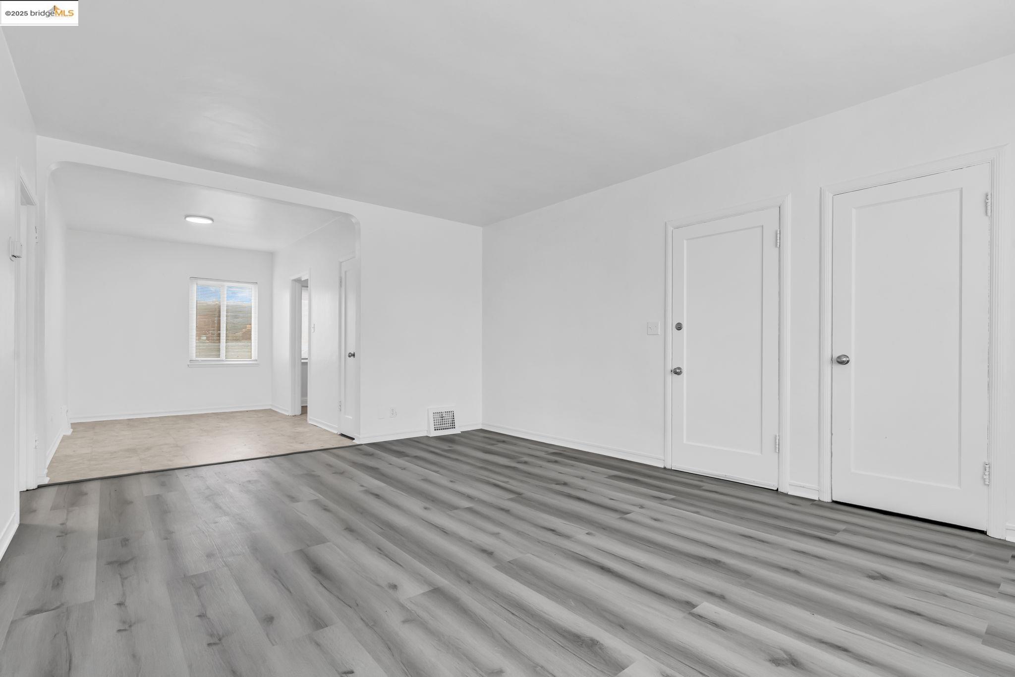 5492 Ruth Avenue Oakland, CA 94601 - Photo 9 of 16 a view of an empty room and wooden floor