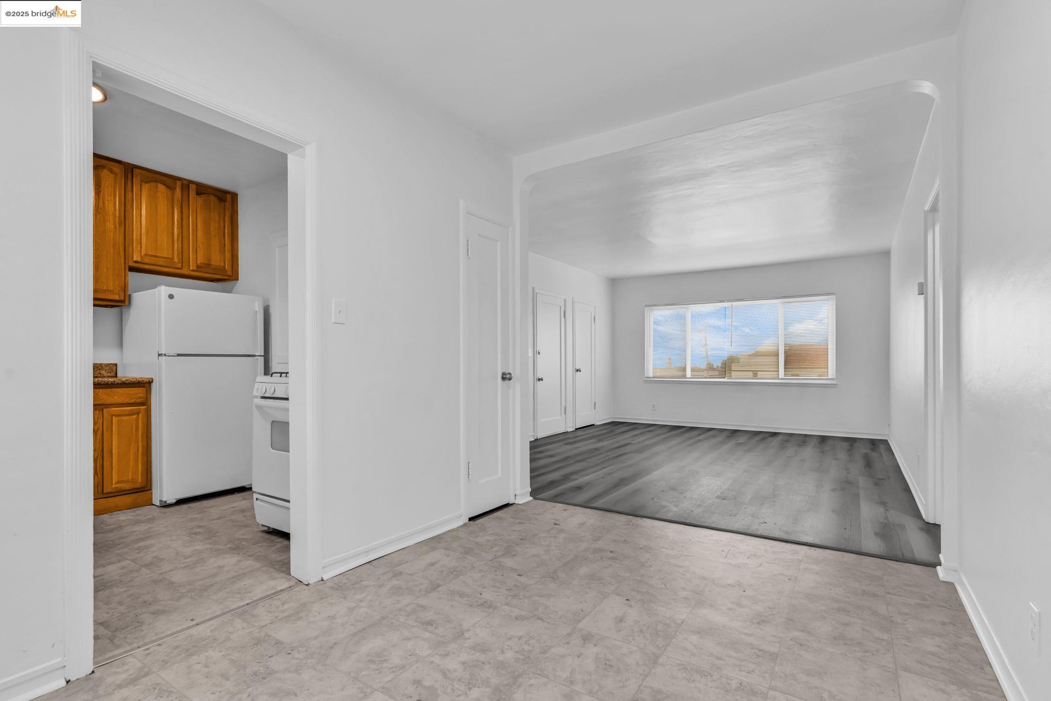 5492 Ruth Avenue Oakland, CA 94601 - Photo 10 of 16 a view of a big room with closet and windows