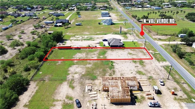 a view of swimming pool with a yard