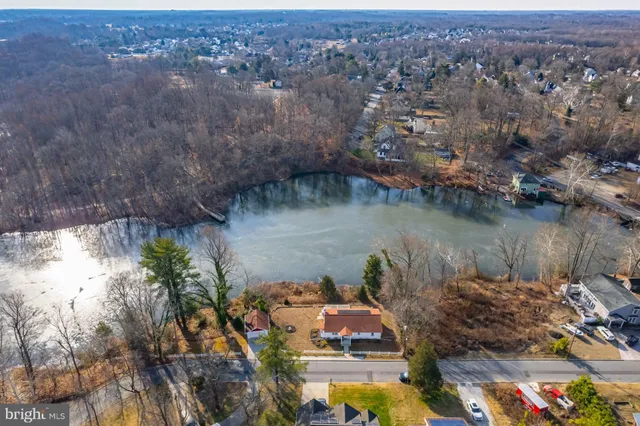 a view of swimming pool with a yard
