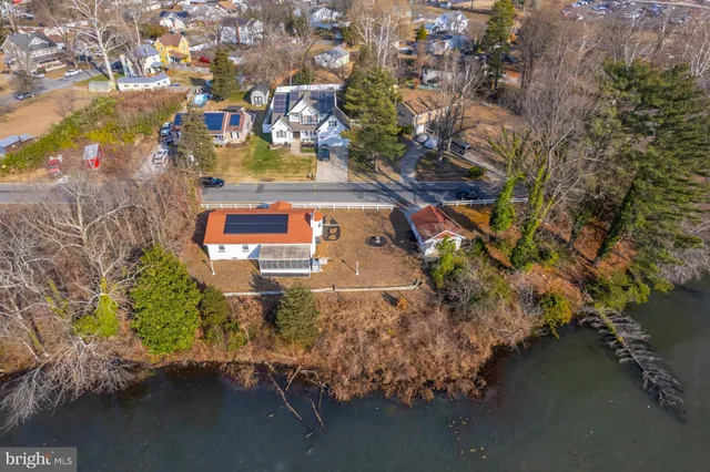 a view of a lake in middle of forest