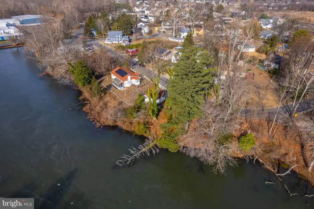 a kitchen with stainless steel appliances granite countertop a stove a sink dishwasher and a refrigerator