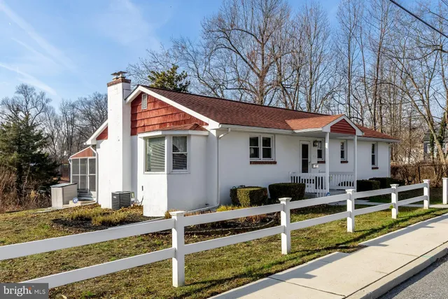 front view of a house with a small yard