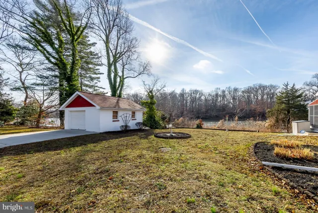 a house with trees in the background