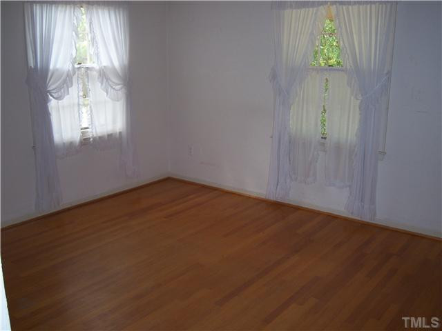 1601 Rosedale Avenue Durham, NC 27707 - Photo 11 of 13 How many of today's homes, even those in the higher price ranges, feature hardwood floors upstairs? Bedroom
