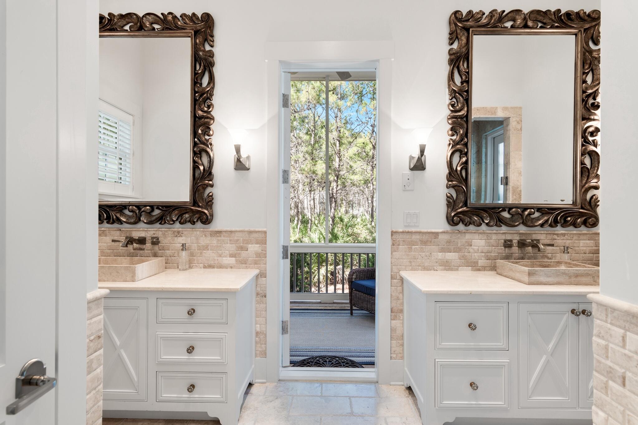 44 Tidepool Lane Watersound, FL 32461 - Photo 15 of 34 a bathroom with a sink and a mirror