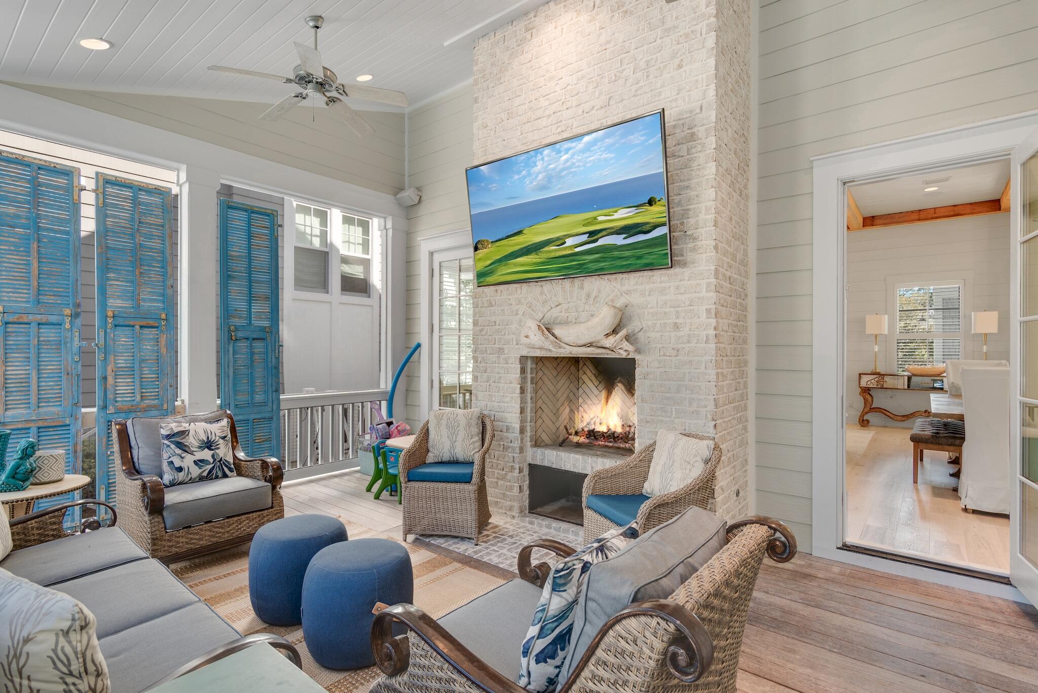 44 Tidepool Lane Watersound, FL 32461 - Photo 16 of 34 a living room with furniture and a fireplace
