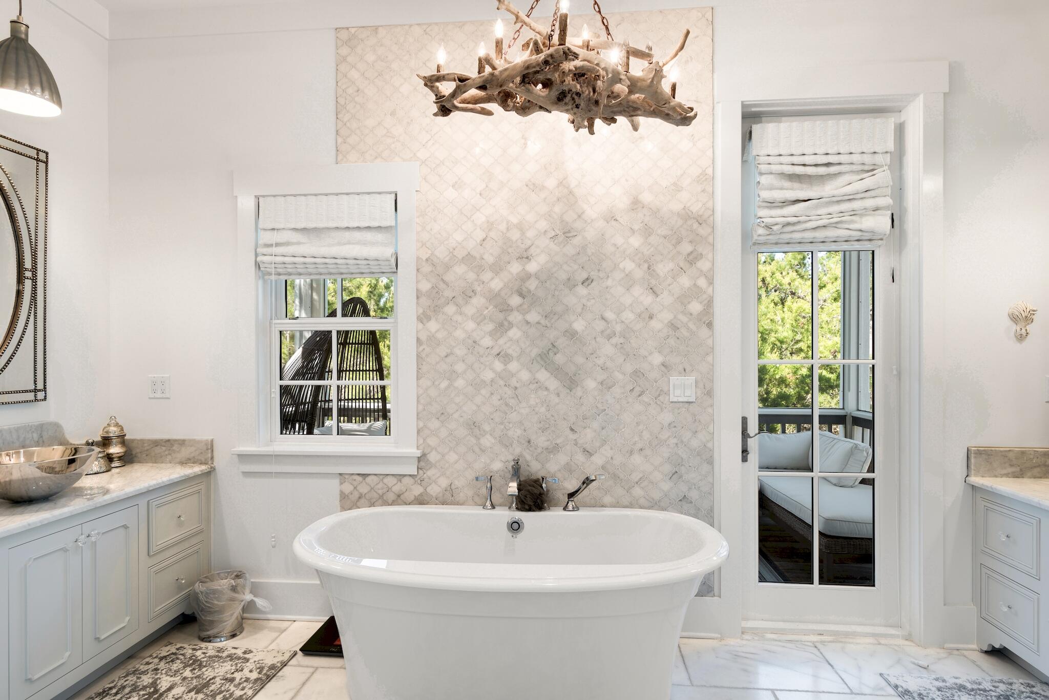 44 Tidepool Lane Watersound, FL 32461 - Photo 20 of 34 a bathroom with a sink a toilet and shower