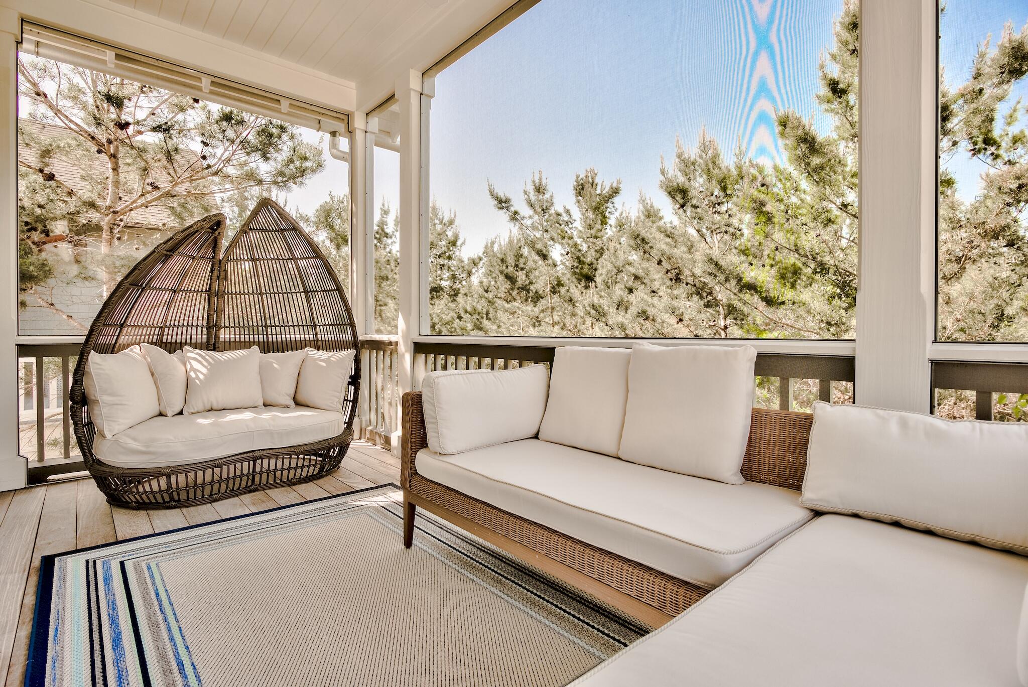 44 Tidepool Lane Watersound, FL 32461 - Photo 27 of 34 a living room with furniture and a large window