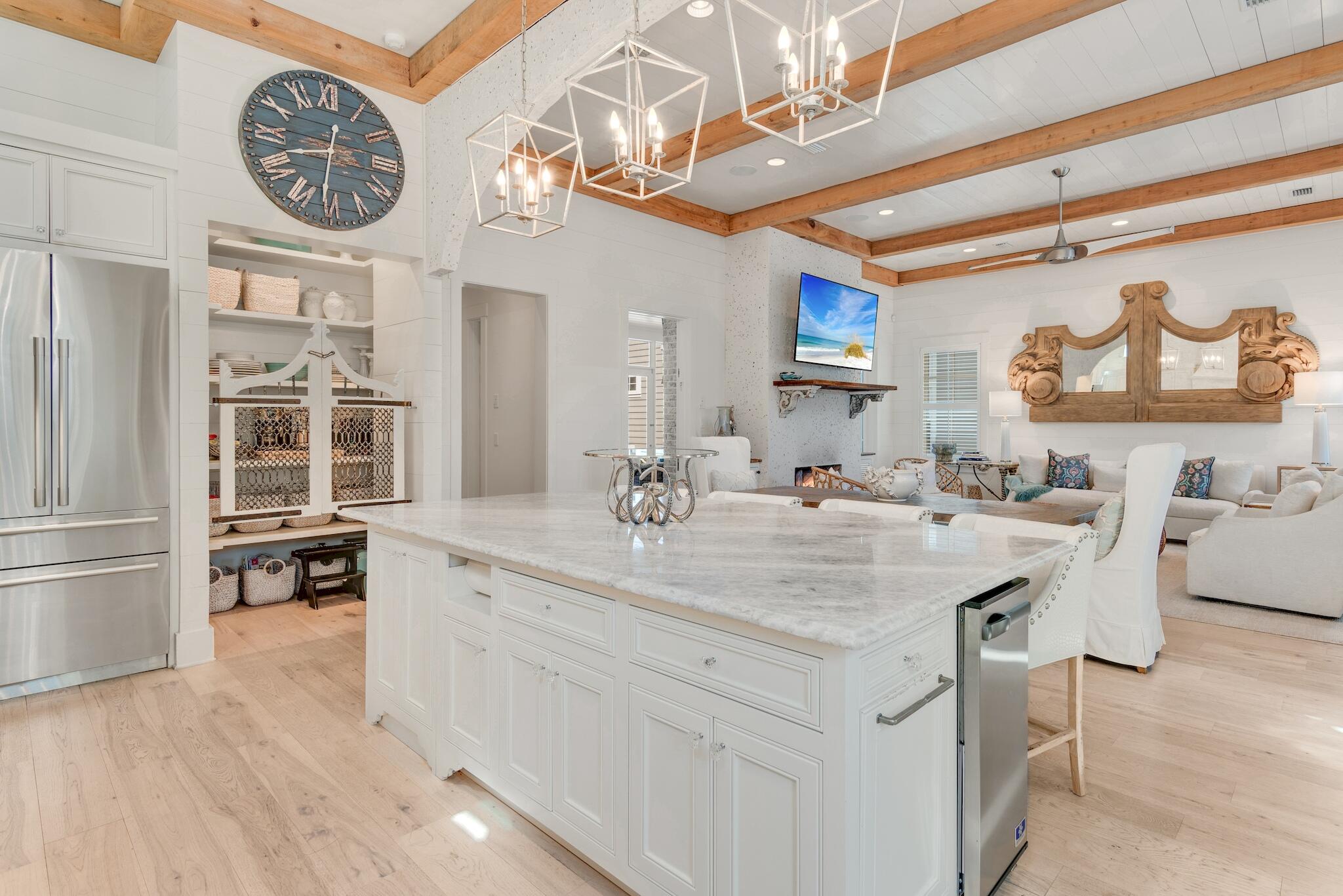 44 Tidepool Lane Watersound, FL 32461 - Photo 9 of 34 a spacious bathroom with a sink a mirror and a large mirror