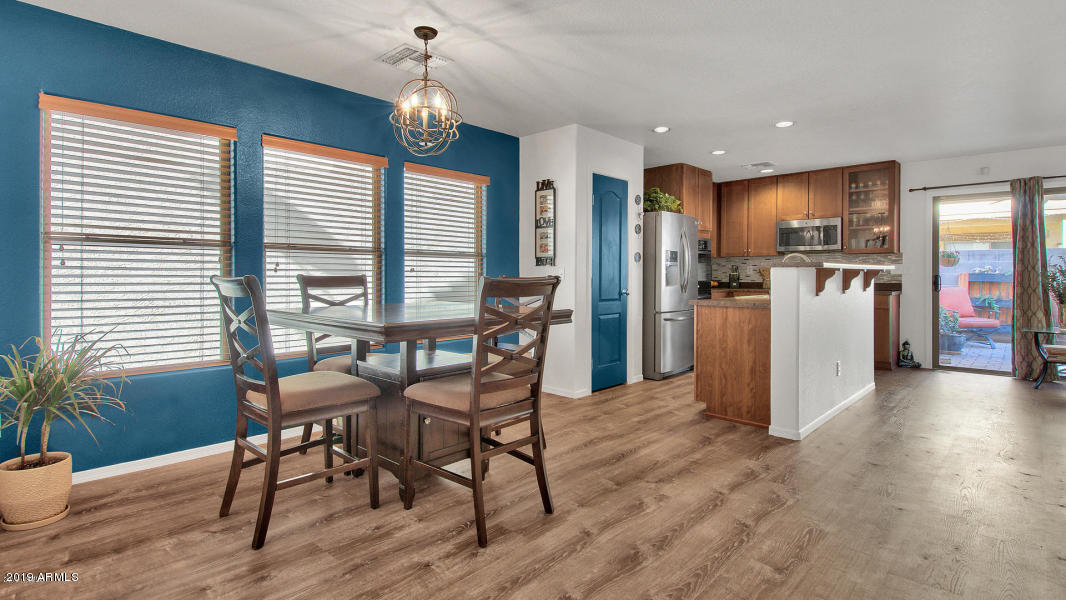6434 West Harwell Road Laveen, AZ 85339 - Photo 5 of 19 Living area and view of kitchen