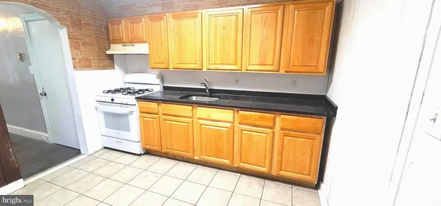 a view of a kitchen with a sink