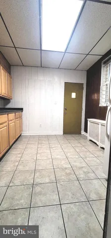 a view of a kitchen with a sink