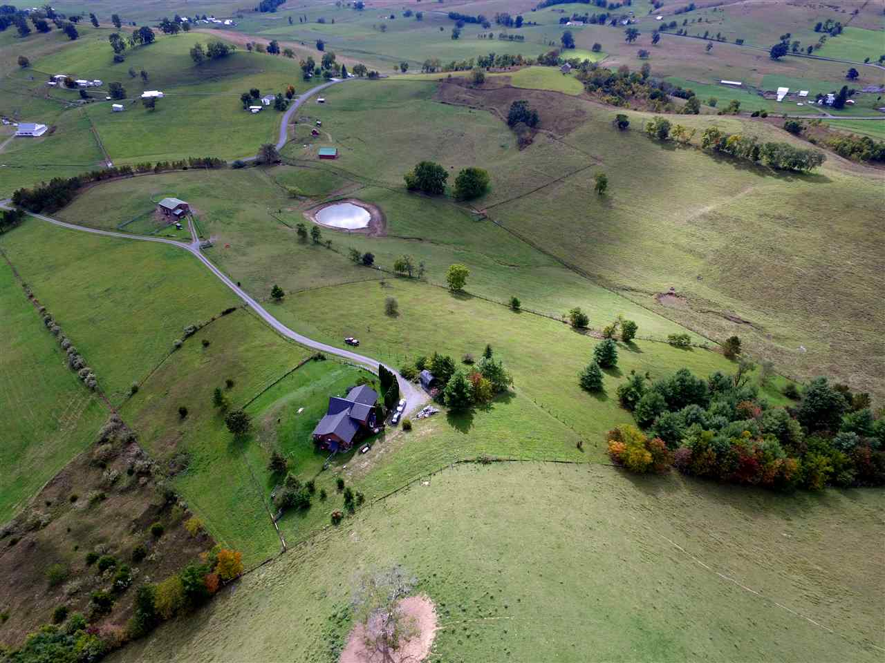 770 Hardscrabble Road Blue Grass, VA 24413 - Photo 23 of 26 an aerial view of a house a yard and mountain view in back