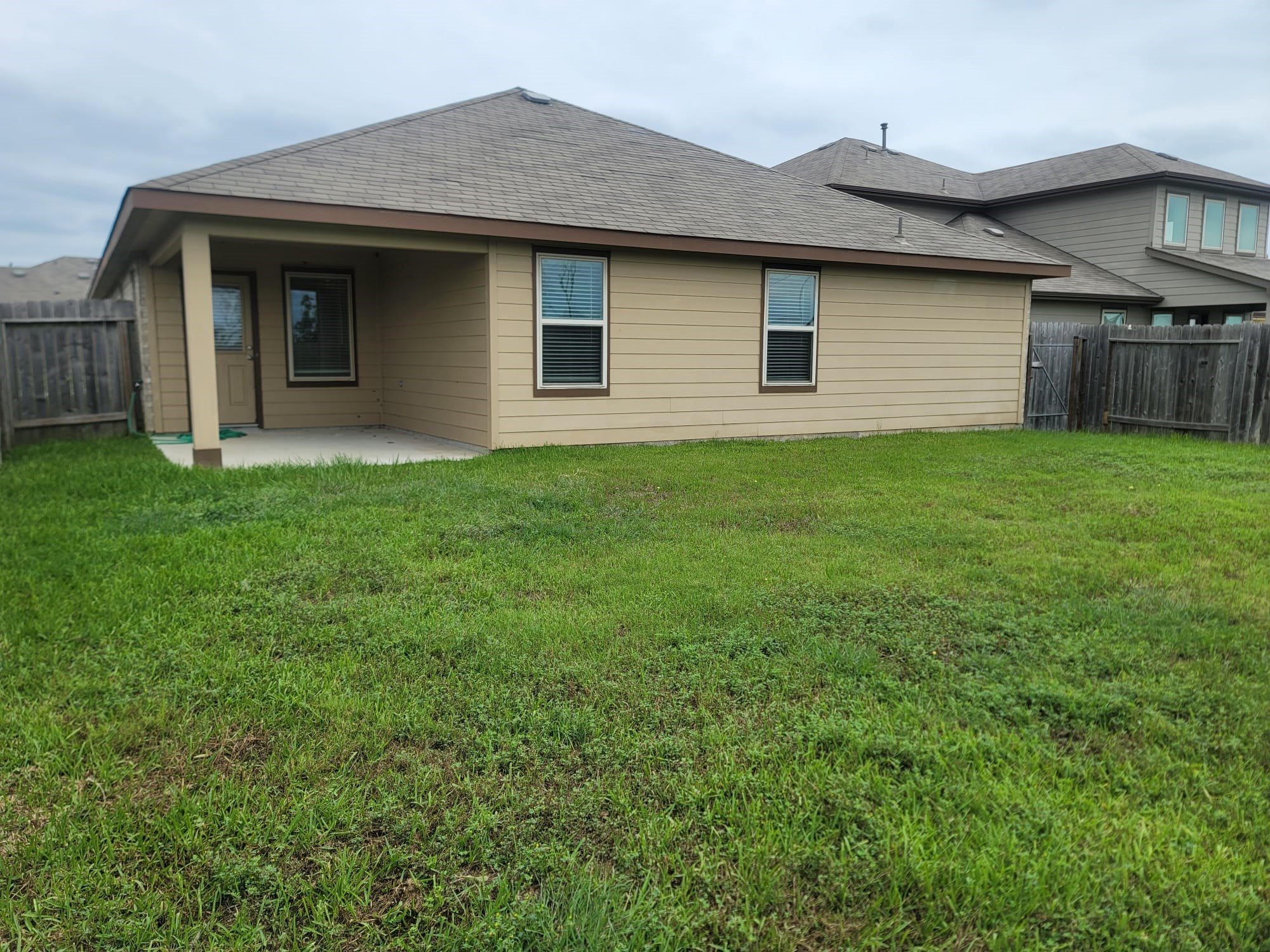 846 Autumn Flats Way Rosharon, TX 77583 - Photo 28 of 33 a front view of a house with a garden