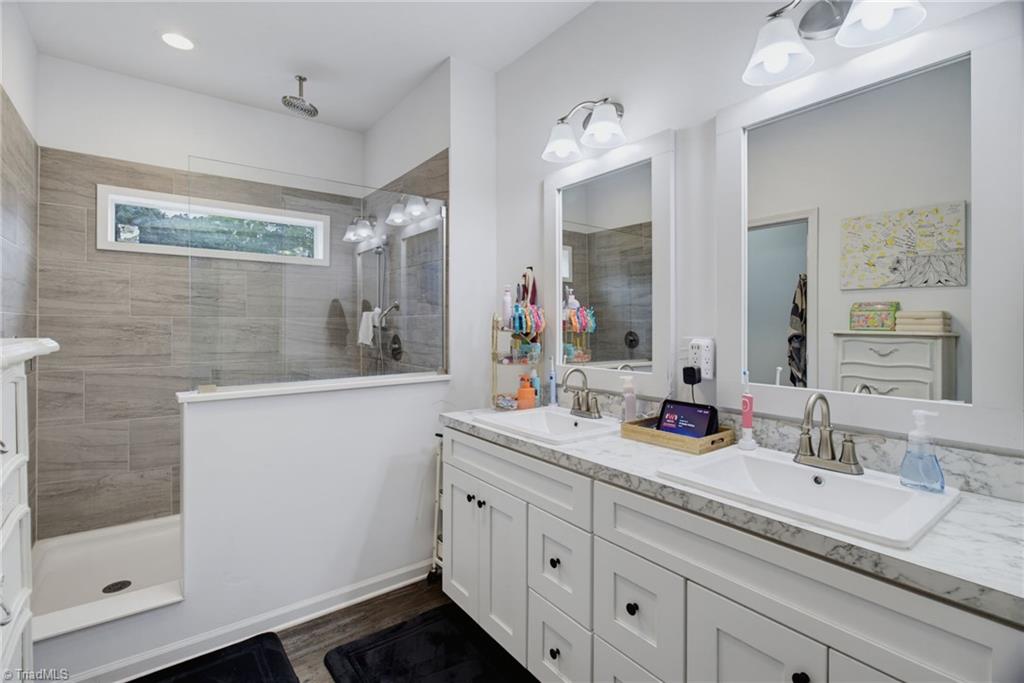 1500 Slate Road King, NC 27021 - Photo 18 of 30 Primary bathroom with large tile shower +2 sinks