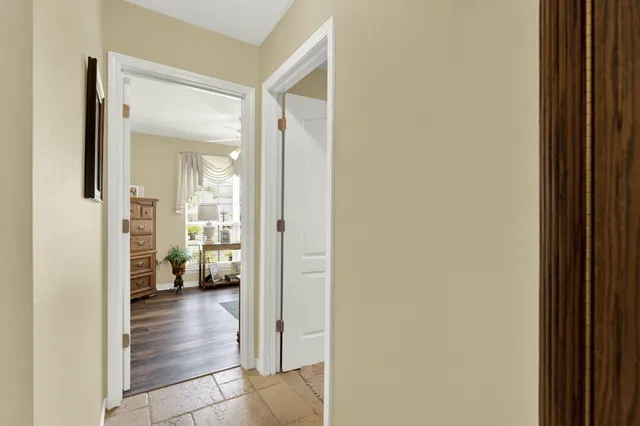a view of a bedroom from a hallway