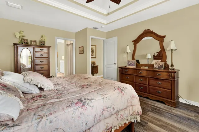 a bathroom with a sink a mirror and vanity