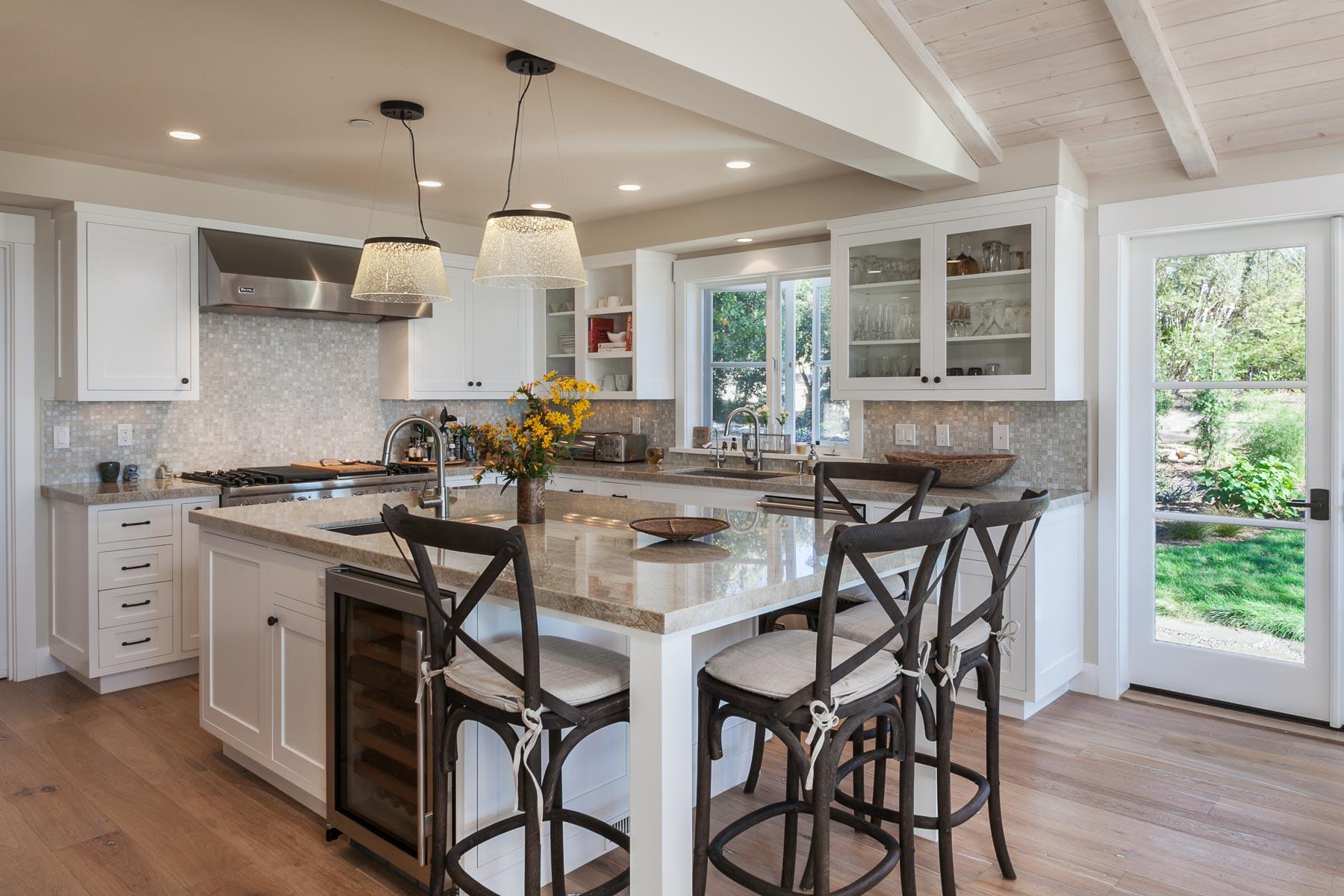 0 Alston Road Santa Barbara, CA 93108 - Photo 11 of 15 a kitchen with stainless steel appliances granite countertop table chairs sink and stove top oven