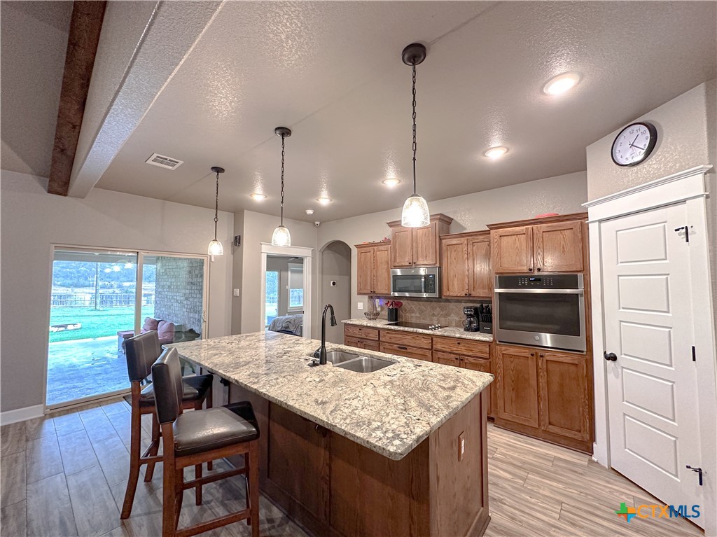 3533 Hooten Bend Kempner, TX 76539 - Photo 14 of 47 a kitchen with a table and chairs in it