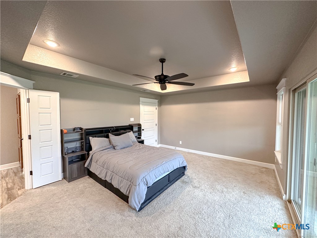 3533 Hooten Bend Kempner, TX 76539 - Photo 20 of 47 a bedroom with a bed and a ceiling fan