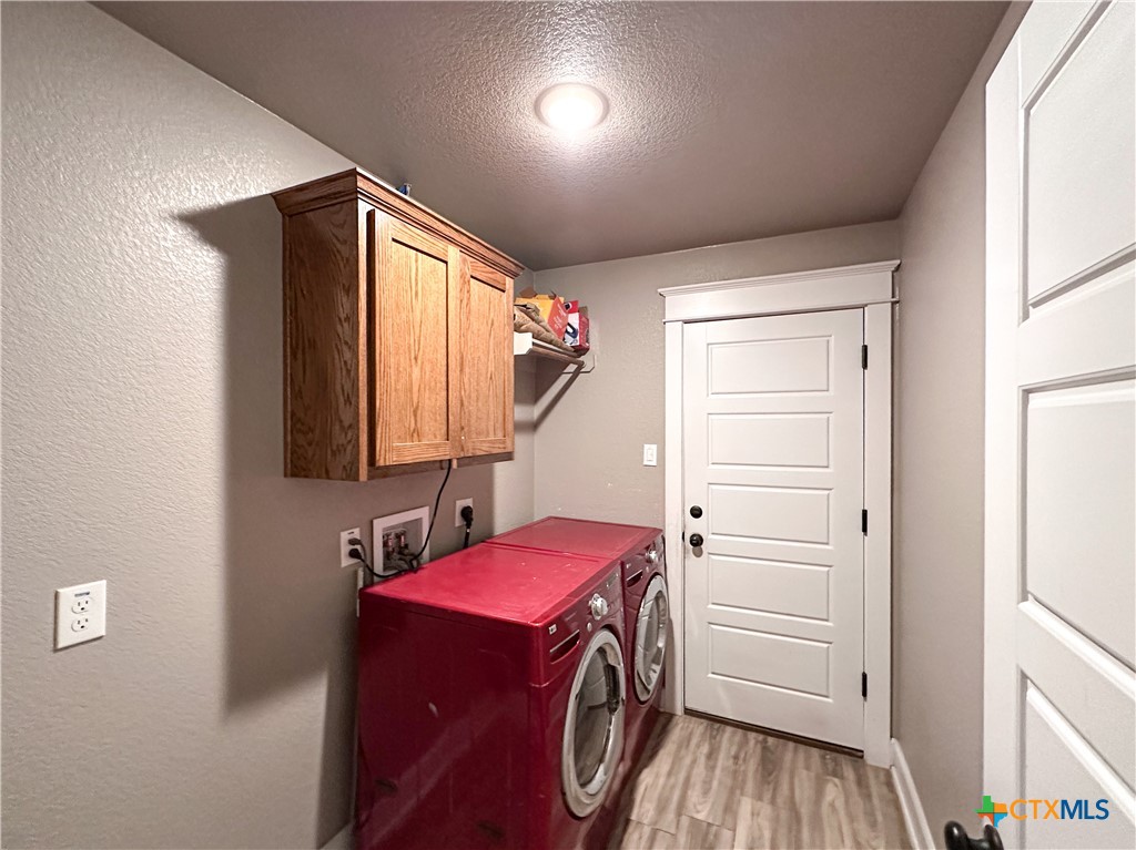 3533 Hooten Bend Kempner, TX 76539 - Photo 26 of 47 a utility room with dryer and washer