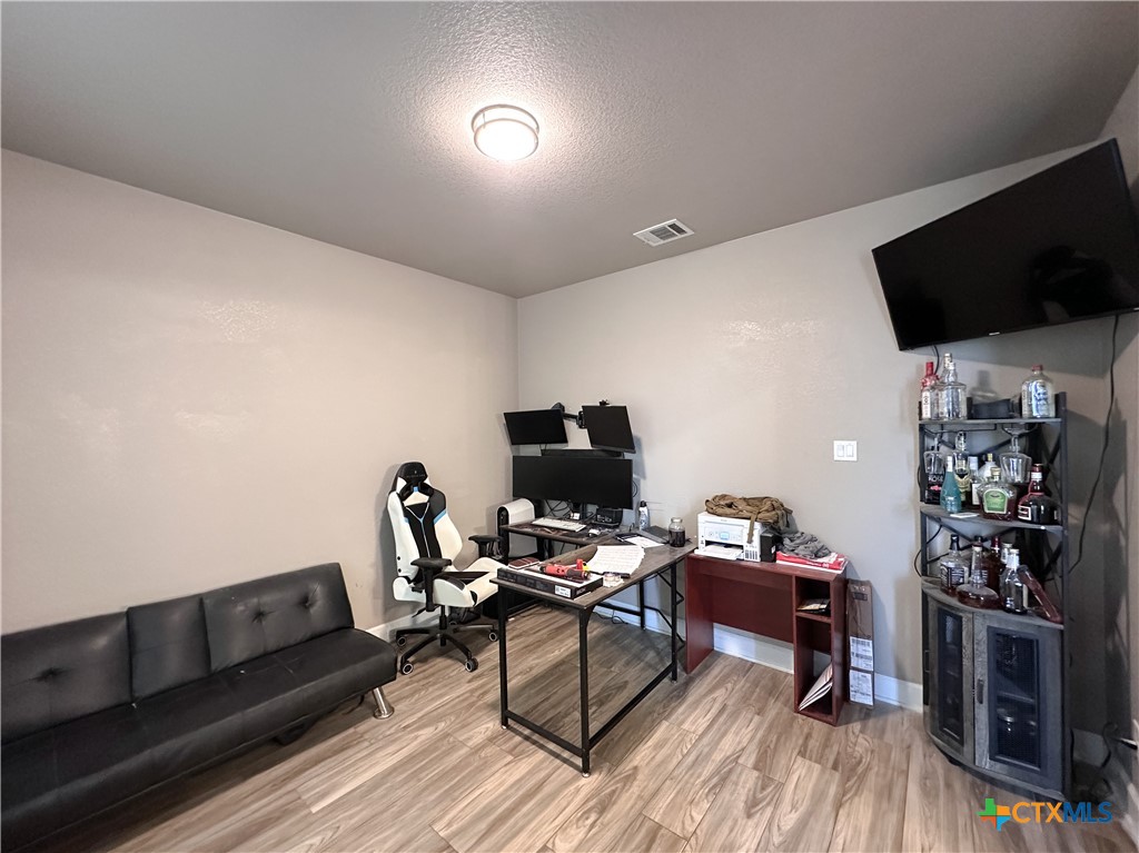 3533 Hooten Bend Kempner, TX 76539 - Photo 7 of 47 a living room with furniture and a flat screen tv