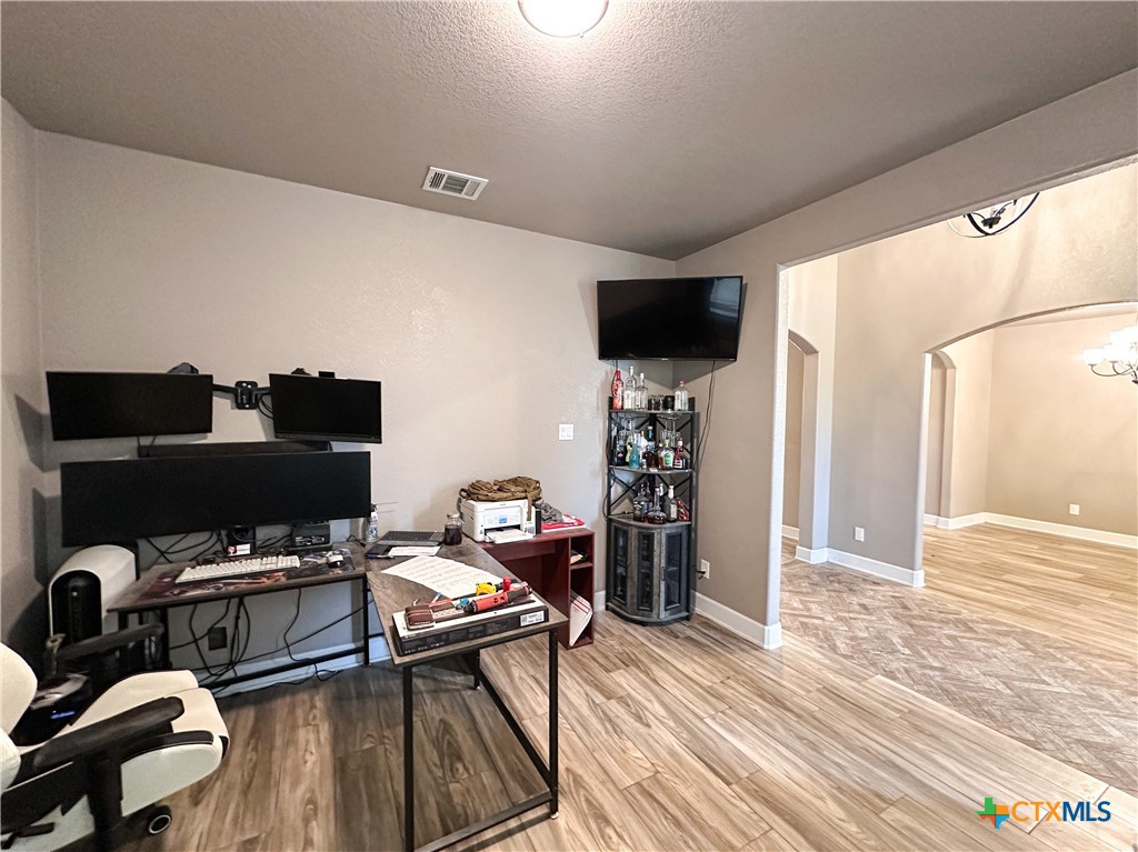 3533 Hooten Bend Kempner, TX 76539 - Photo 8 of 47 a view of a workspace with furniture and wooden floor