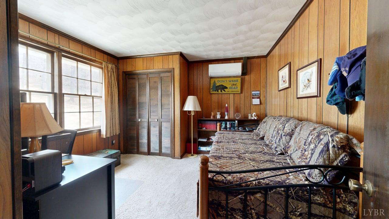 426 Burgess Road Madison Heights, VA 24572 - Photo 25 of 51 a living room with furniture and a window