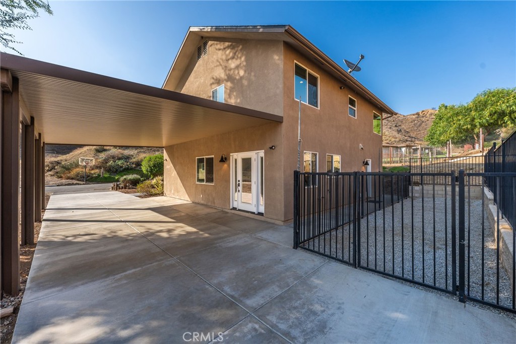 30300 Live Oak Canyon Road Redlands, CA 92373 - Photo 16 of 67 a view of a house with a balcony