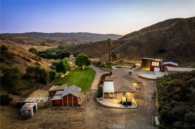 an aerial view of a house with a garden