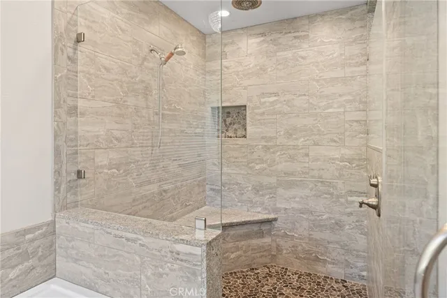 a kitchen with stainless steel appliances kitchen island a refrigerator sink and stove