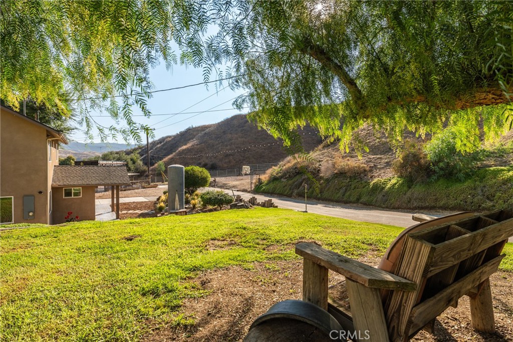 30300 Live Oak Canyon Road Redlands, CA 92373 - Photo 38 of 67 a view of a swimming pool with a patio