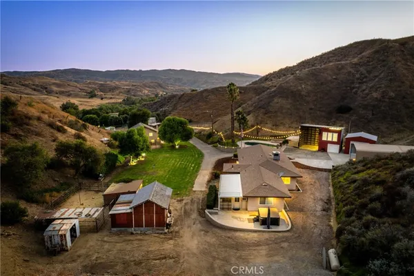 a backyard of a house with seating space
