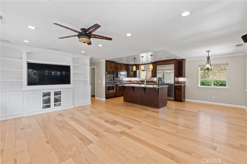 30300 Live Oak Canyon Road Redlands, CA 92373 - Photo 43 of 67 a kitchen with stainless steel appliances kitchen island a refrigerator sink and stove