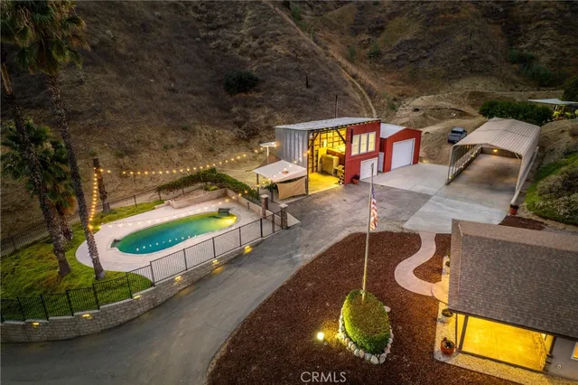 a view of a swimming pool with a patio